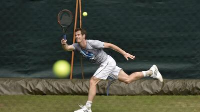 Andy Murray hits a return during a training session on Tuesday at the 2014 Wimbledon Championships. Toby Melville / Reuters